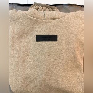 Fear of god essentials heather grey 2024 hoodie